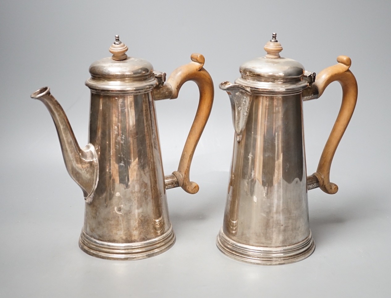 A modern silver cafe au lait pair, William Comyns & Sons Ltd, London, 1962